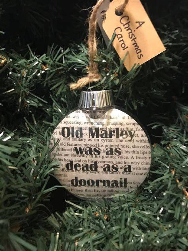Who is described as dead as a doornail in a christmas carol?